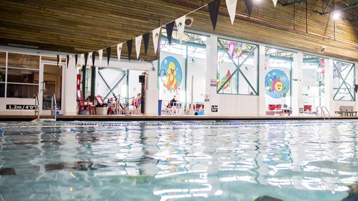 main pool view looking over at leisure pool and viewing room
