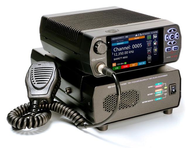 Two-way radio with control panel and microphone.