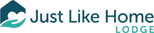 Logo for "Just Like Home Lodge" featuring a house silhouette and stylized text.